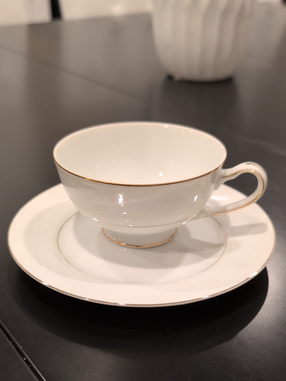 White Porcelain Tea Cup & Saucer with Gold Trim
